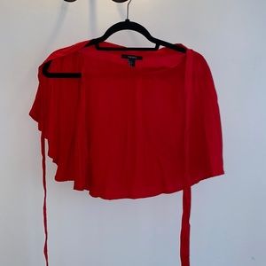 Pleated red flowy mini skirt